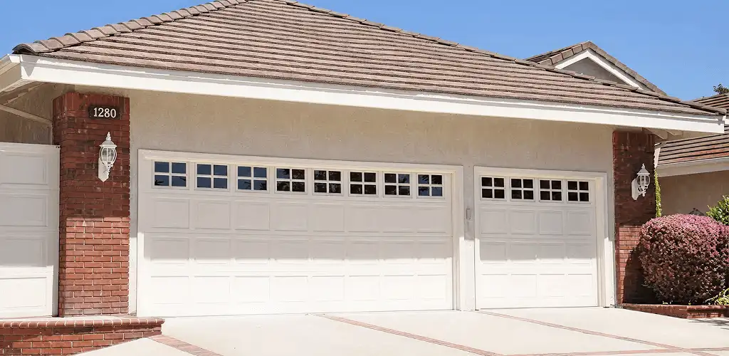 Residential garage door repair service for a double garage door in Saint Petersburg, FL
