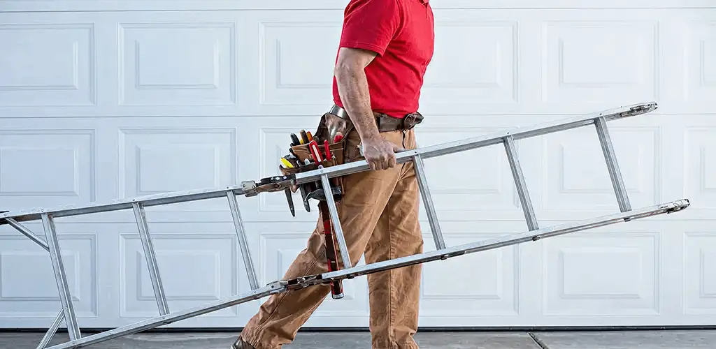 Garage door repair technician arriving with tools and ladder in Saint Petersburg, FL