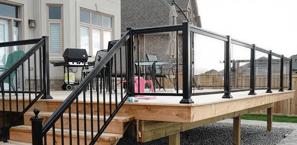 Handrail installation on a deck staircase for safety and code compliance in Saint Petersburg, FL